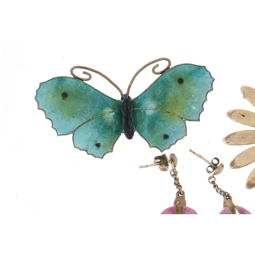 699 - Silver jewellery comprising a Danish flower brooch, enamelled butterfly brooch by John Atkins & Sons... 