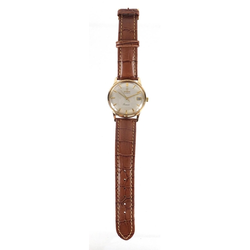 708 - Gentleman's 9ct gold Omega Geneve automatic wristwatch, with date dial, 3.4cm in diameter