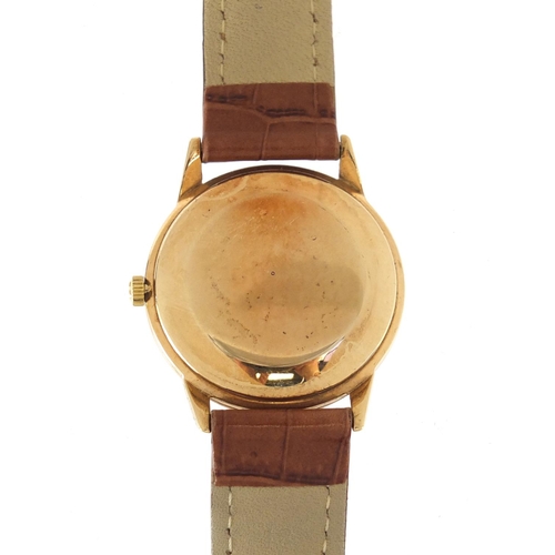 708 - Gentleman's 9ct gold Omega Geneve automatic wristwatch, with date dial, 3.4cm in diameter