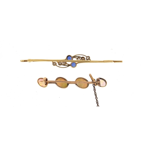 666 - Two unmarked gold bar brooches set with opals, diamonds and sapphires, the largest 6cm in length, 7.... 