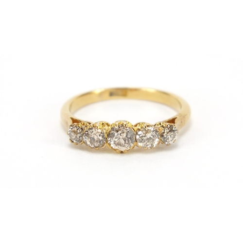 671 - 18ct gold diamond five stone ring, size K, 2.2g