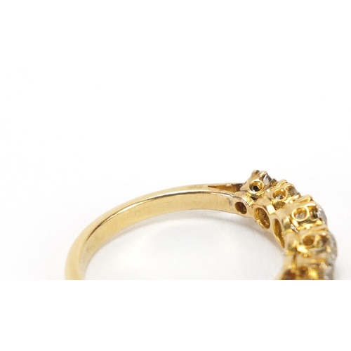 671 - 18ct gold diamond five stone ring, size K, 2.2g