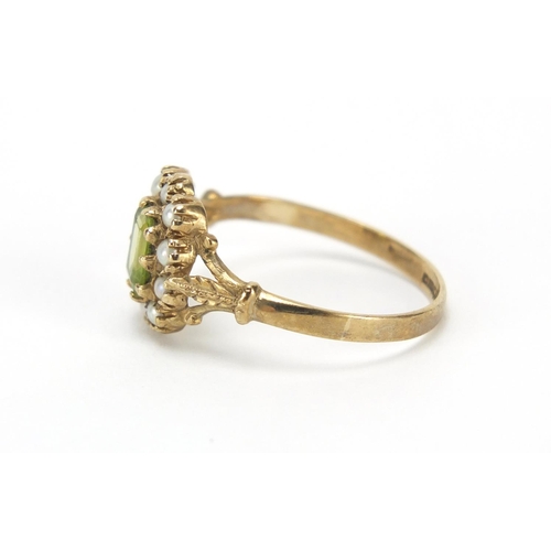 662 - 9ct gold peridot and seed pearl ring, size O, 1.8g