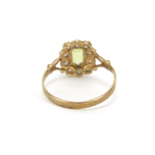 662 - 9ct gold peridot and seed pearl ring, size O, 1.8g