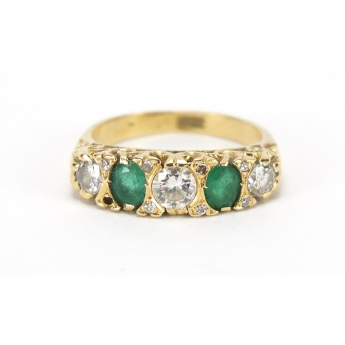 644 - 18ct gold diamond and emerald ring, size L, 4.6g