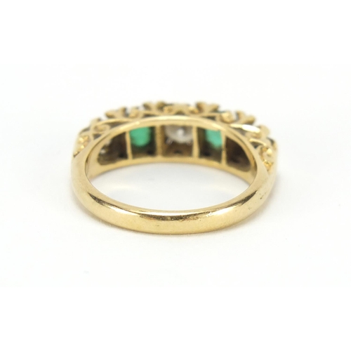 644 - 18ct gold diamond and emerald ring, size L, 4.6g