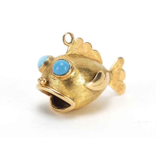 641 - 14ct gold fish charm with turquoise eyes, HW makers mark, 3cm in length, 6.5g