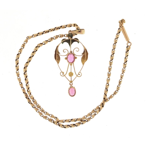 652 - Art Nouveau unmarked gold pendant, set with pink stones on a 9ct gold necklace, the pendant 5.5cm in... 