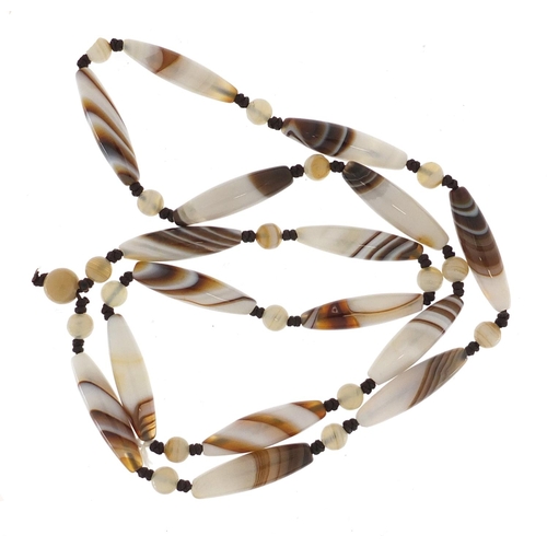 696 - Islamic agate elongated bead necklace, 60cm in length, 44.2g