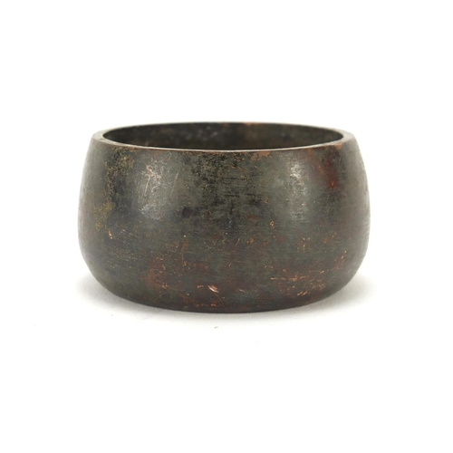 389 - Chinese patinated bronze incense burner, impressed character marks to the base, 5.5cm in diameter