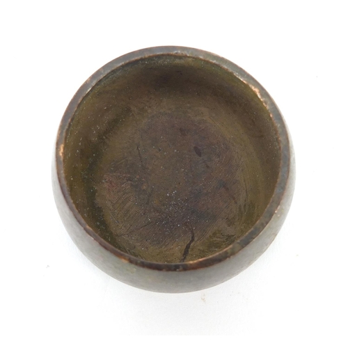 389 - Chinese patinated bronze incense burner, impressed character marks to the base, 5.5cm in diameter