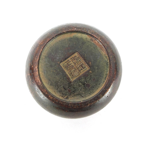 389 - Chinese patinated bronze incense burner, impressed character marks to the base, 5.5cm in diameter