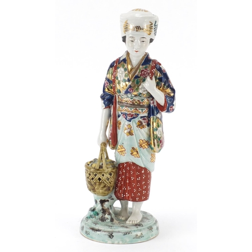 393 - Japanese porcelain figurine of a girl holding a basket, 33cm high