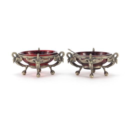 634 - Pair of Victorian novelty silver plated swan design salts with ruby glass liners, one with a spade d... 