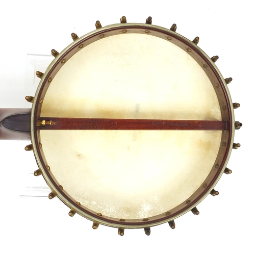 89 - 19th century A C Fairbanks and Cole banjo with ivory keys, impressed marks to the tension bar, 88cm ... 