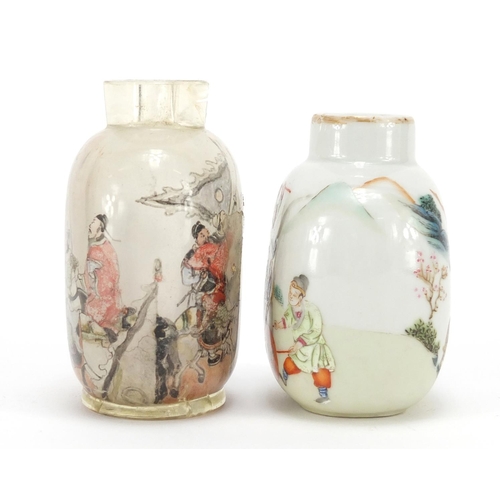 348 - Two Chinese snuff bottles including a porcelain example finely hand painted with figures and animals... 