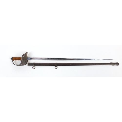 275 - British Military dress sword with scabbard, the steel blade engraved with Regimental motifs, 103cm i... 