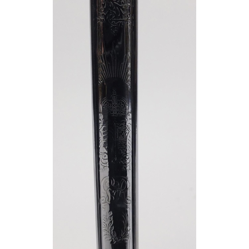 275 - British Military dress sword with scabbard, the steel blade engraved with Regimental motifs, 103cm i... 