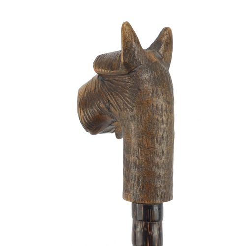 116 - Bamboo walking stick with black forest dogs head design pommel, having moveable mouth, 91cm in lengt... 