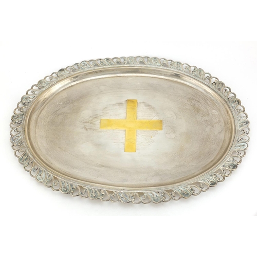 593 - Large oval silver tray with pierced border, presented to Sir J K Chande, 46.5cm in length