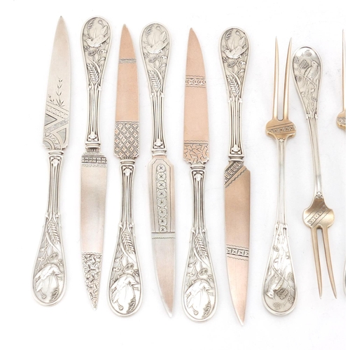 626 - Set of six sterling silver knifes and forks by Tiffany & Co, each cast with a kingfisher perched amo... 