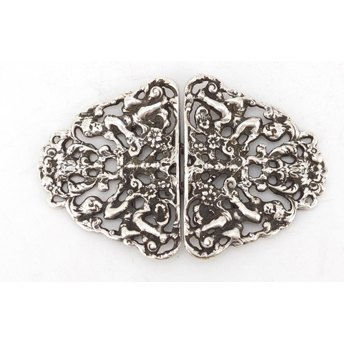 606 - Victorian style silver two piece nurses buckle embossed with putti, PJB London 1961, 10.5cm in lengt... 