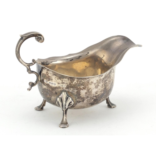 596 - Silver sauce boat by James Dixon & Sons Ltd, raised on with three hoof feet, Sheffield 1937, 15.5cm ... 