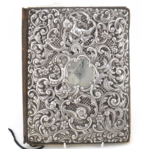 592 - Large Victorian silver mounted blotter, by Goldsmiths and Silversmiths Company Ltd, pierced and embo... 