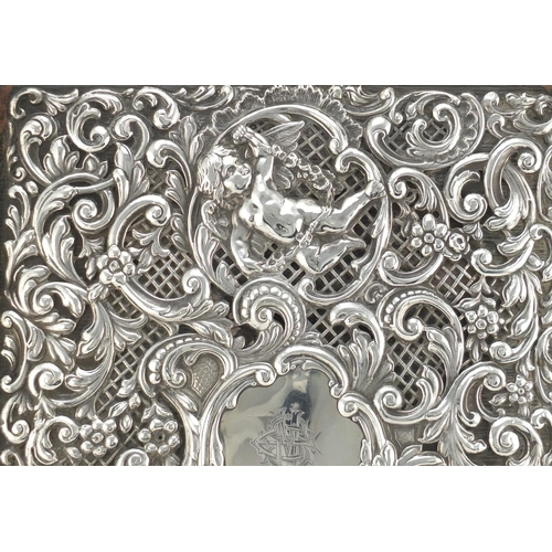 592 - Large Victorian silver mounted blotter, by Goldsmiths and Silversmiths Company Ltd, pierced and embo... 