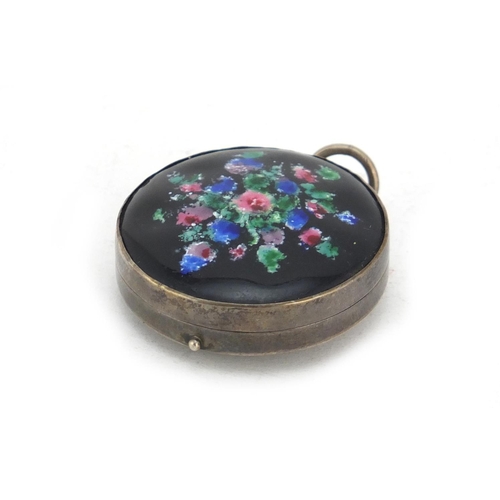 607 - Circular sterling silver compact, the hinged lid enamelled with flowers, 3.5cm in diameter, 24.5g