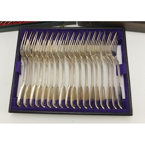 631 - Set of eighteen German silver knives, forks and spoons, all housed in a velvet and silk lined tooled... 