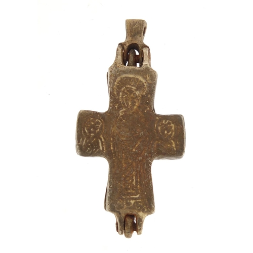 692 - Silver coloured metal Byzantine design cross relic, engraved with religious icons, 5.5cm in length, ... 