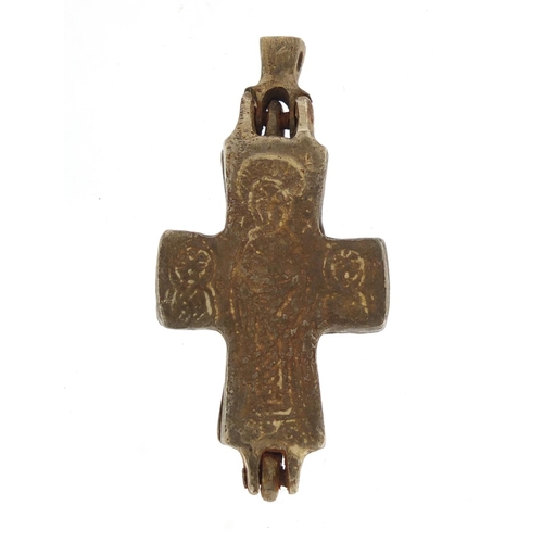 692 - Silver coloured metal Byzantine design cross relic, engraved with religious icons, 5.5cm in length, ... 