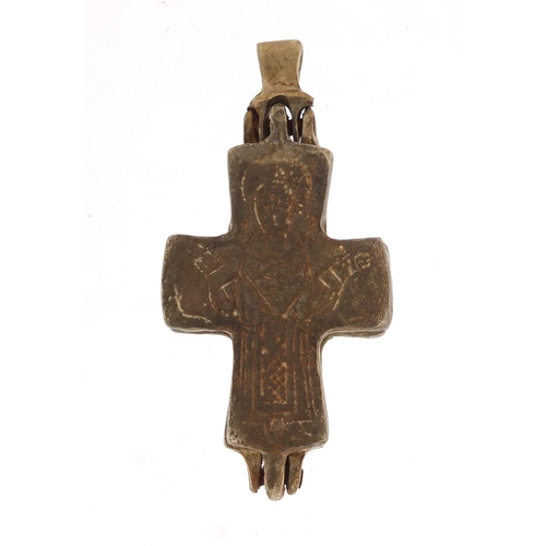 692 - Silver coloured metal Byzantine design cross relic, engraved with religious icons, 5.5cm in length, ... 