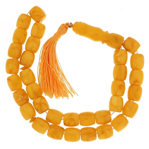 696A - String of Islamic butterscotch egg yolk amber coloured prayer beads, 50cm in length, 62.2g