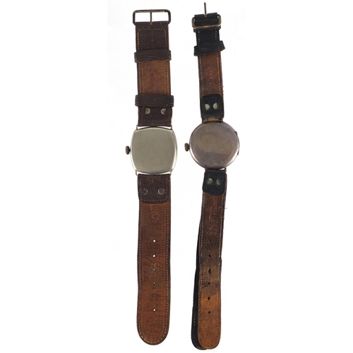 706A - Two Military interest trench watches, one with silver case, each with luminous hands and dial, the l... 