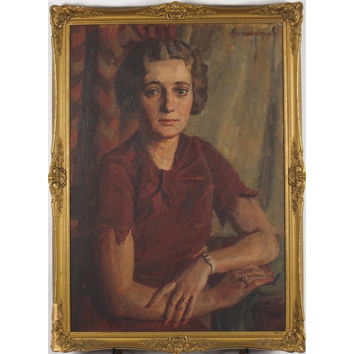 854 - Goldberg - Portrait of a female in a burgundy dress, oil on canvas, framed, 76cm x 53cm