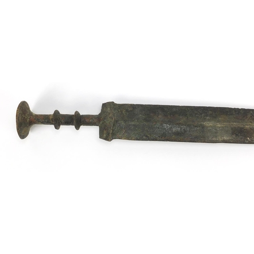 283 - Islamic patinated bronze sword, 64cm in length