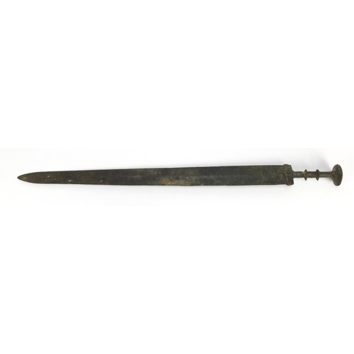 283 - Islamic patinated bronze sword, 64cm in length