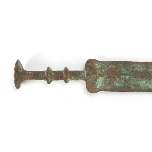 284 - Islamic patinated bronze sword, 64.5cm in length