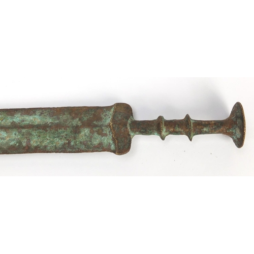 284 - Islamic patinated bronze sword, 64.5cm in length