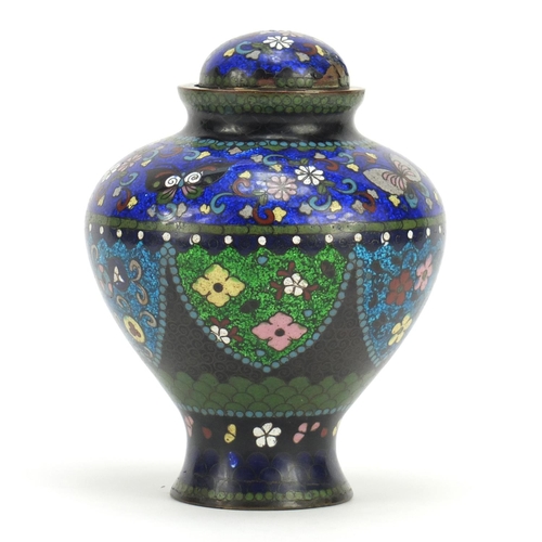 387 - Japanese cloisonné koro with cover, enamelled with butterflies and panels of flowers, 14.5cm high