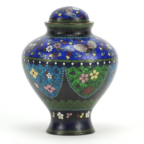 387 - Japanese cloisonné koro with cover, enamelled with butterflies and panels of flowers, 14.5cm high