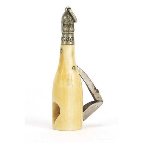 86 - Novelty ivory cigar cutter in the form of a champagne bottle, 5.3cm in high