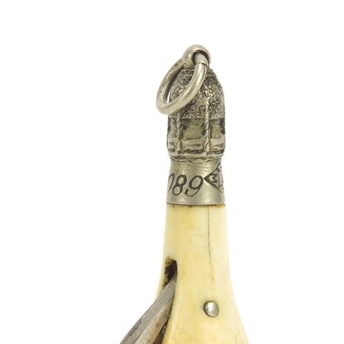 86 - Novelty ivory cigar cutter in the form of a champagne bottle, 5.3cm in high