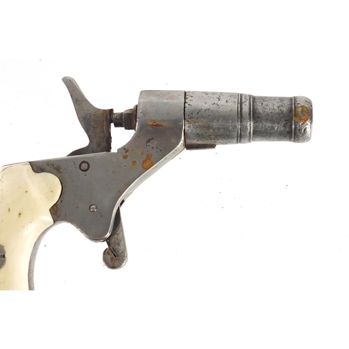 292 - Antique percussion pocket pistol with cannon barrel and ivory grip, 10.5cm in length