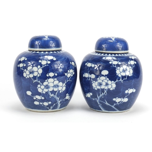 316 - Pair of Chinese blue and white porcelain ginger jars with covers, each hand painted with prunus flow... 