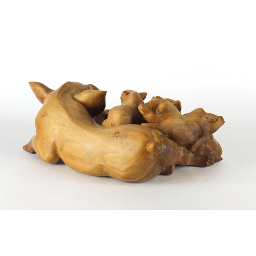 239 - Carved wood group of a pig with piglets, 33cm in length