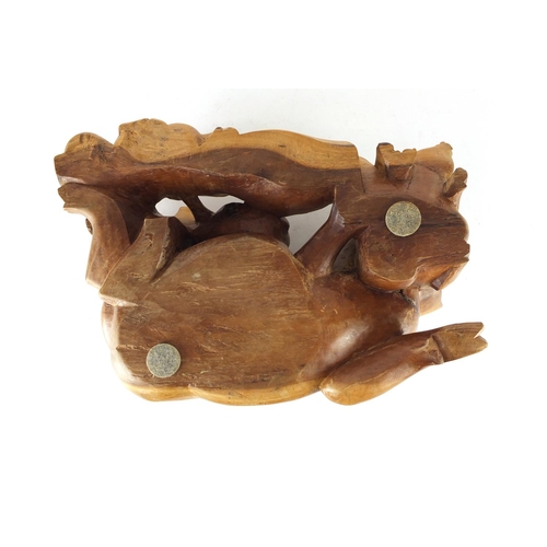 239 - Carved wood group of a pig with piglets, 33cm in length