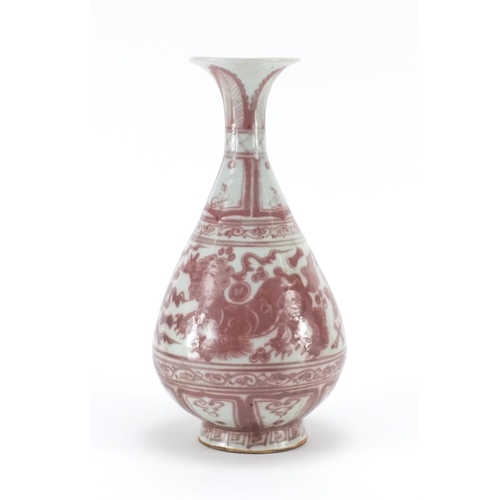 318 - Chinese porcelain vase hand painted in iron red with Qilins amongst clouds, 31cm high